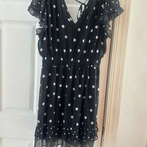 Elegant Black Dress with White Polka Dots